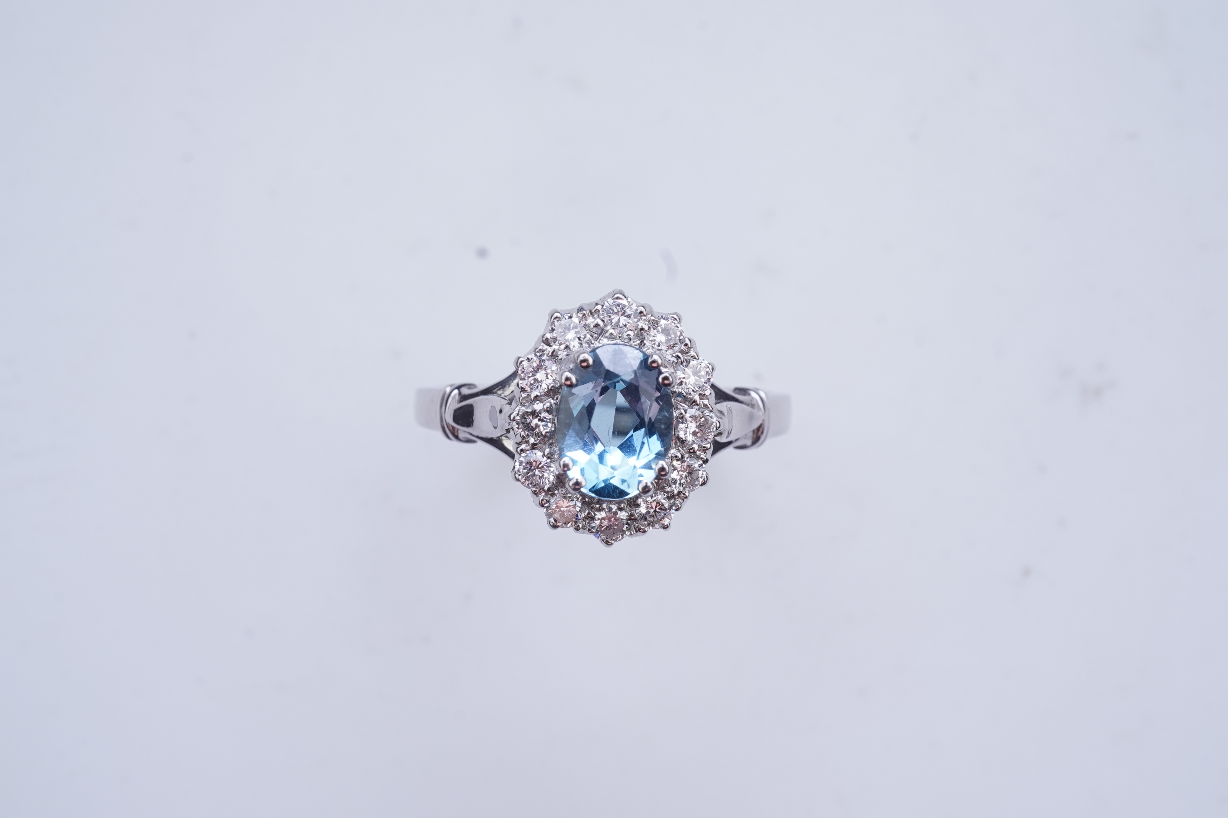 An aquamarine and diamond cluster ring